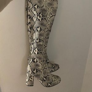 Snake skin thigh high boots